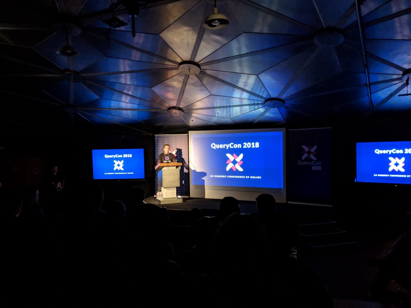 QueryCon 2018 stretching the limits of the fire code in the tiny theater inside of the Palace of Fine Arts